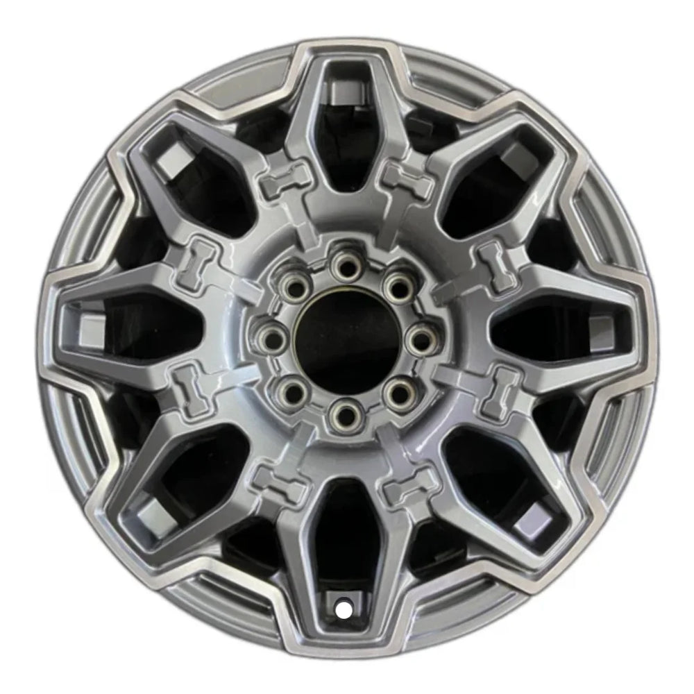 22-inch Hummer EV OEM wheel ALY14094U90. Polished Charcoal rim front view.